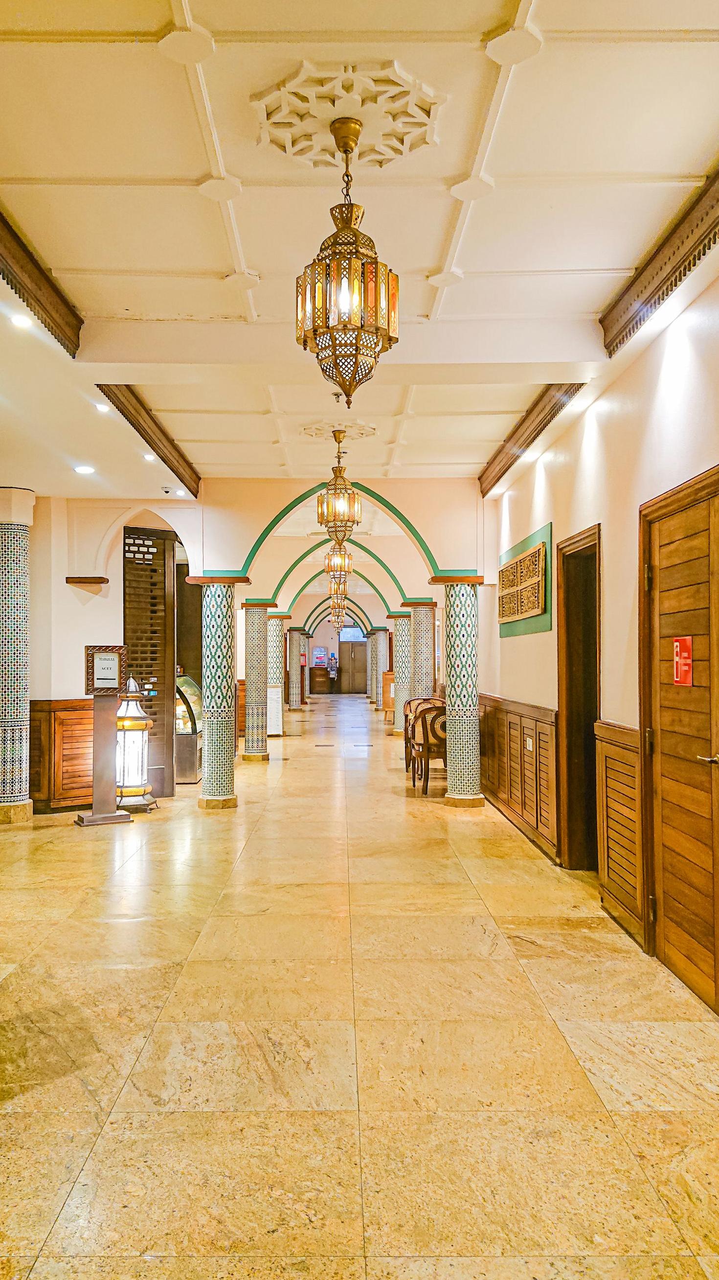 Hallowreach Hotel arched entrance at dusk